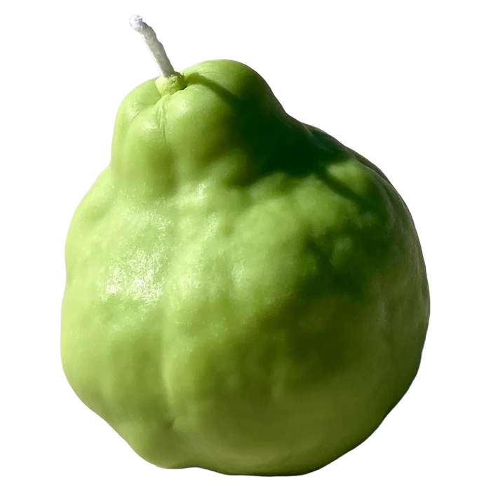Realistic green pear shaped candle with a brown stem on a white surface