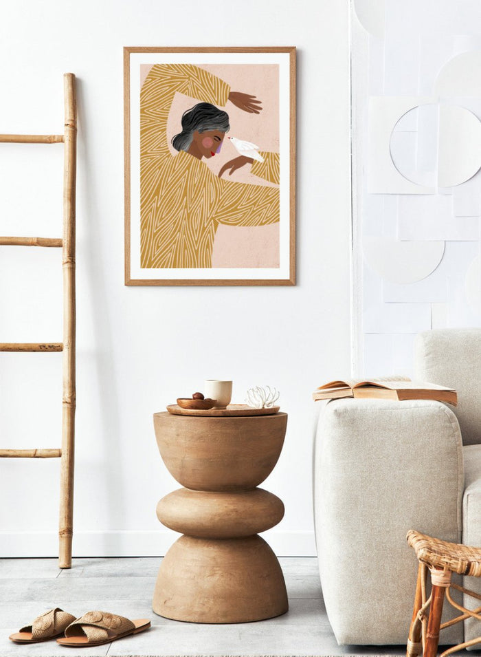 The Woman With a Bird by Bea Müller is an officially licensed art print featuring a modern illustrated woman and a white bird. Available framed or unframed.