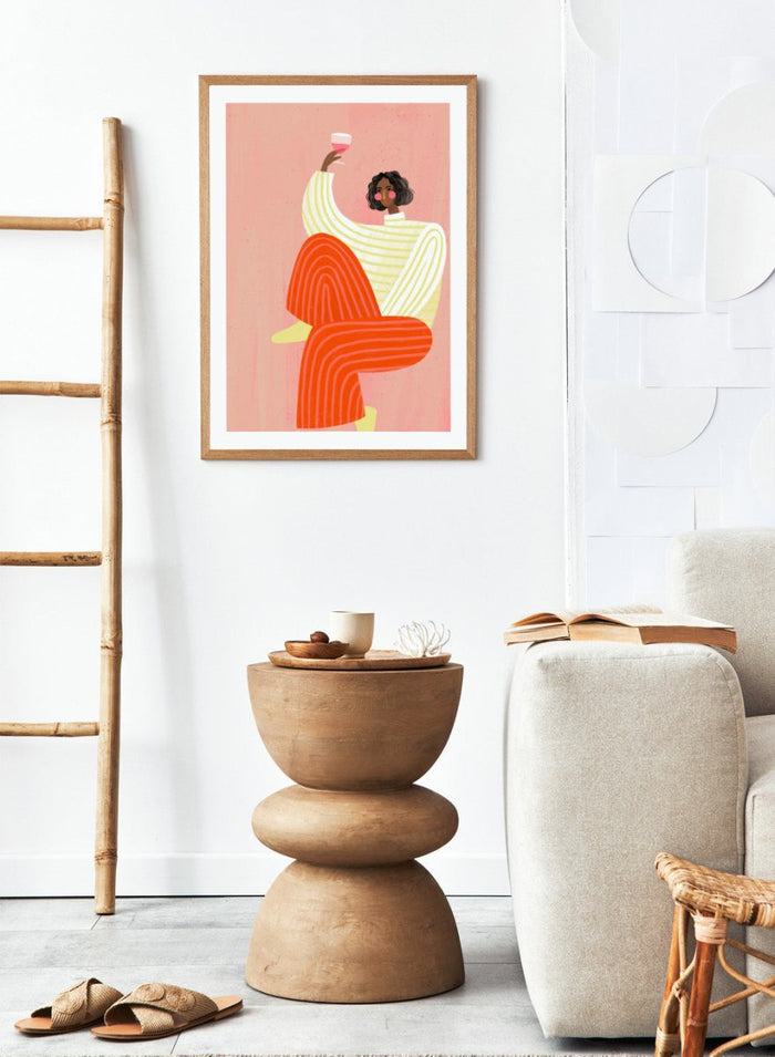 The Woman With a Glass of Wine by Bea Müller is an officially licensed art print featuring bold color and a modern illustrated portrait. Available framed or unframed.