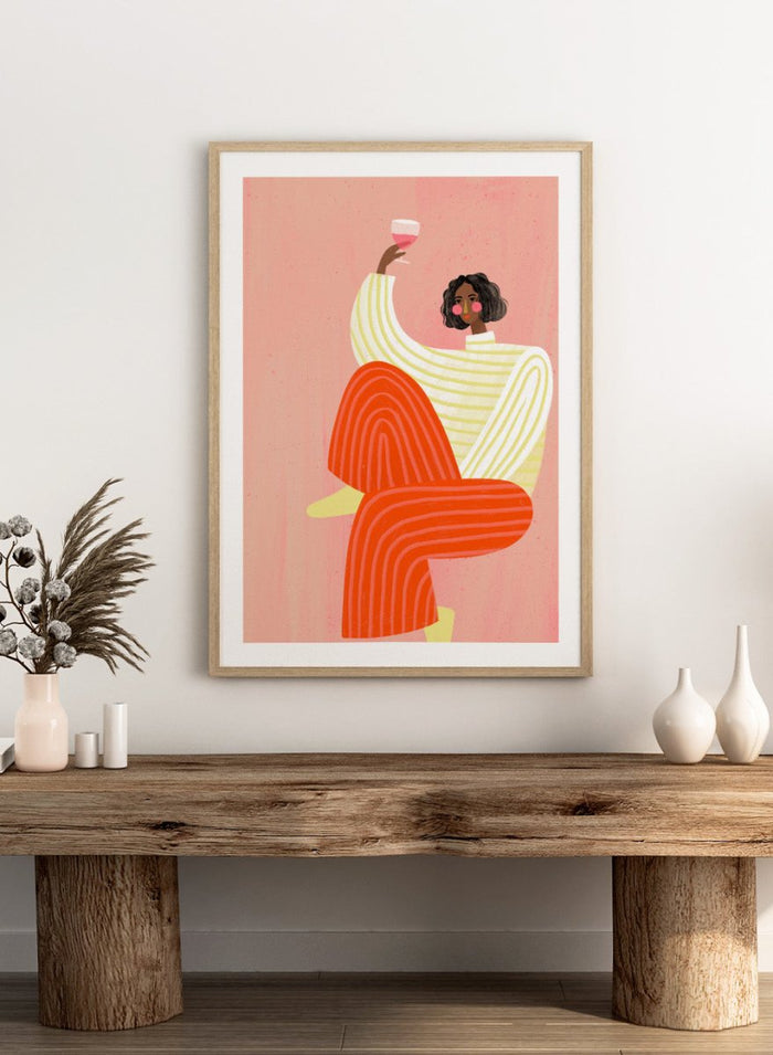 The Woman With a Glass of Wine by Bea Müller is an officially licensed art print featuring bold color and a modern illustrated portrait. Available framed or unframed.