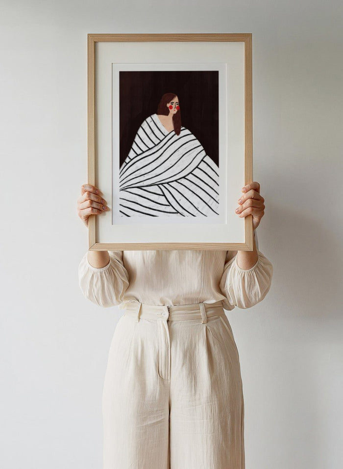 The Woman With Black and White Stripes by Bea Müller is an officially licensed art print featuring a bold modern portrait with graphic stripes. Available framed or unframed.