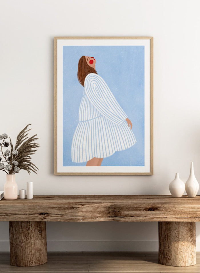 The Woman With the Blue Stripes by Bea Müller is an officially licensed art print featuring soft blue tones and a flowing modern portrait. Framed or unframed options available.
