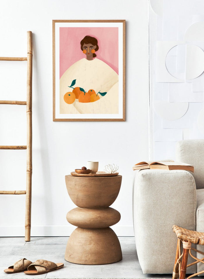 The Woman With the Oranges by Bea Müller is an officially licensed art print featuring warm citrus tones and a modern illustrated portrait. Available framed or unframed.
