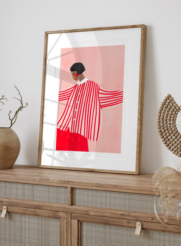 The Woman With the Red Stripes by Bea Müller is an officially licensed art print featuring bold red patterns and a modern illustrated woman. Available framed or unframed.