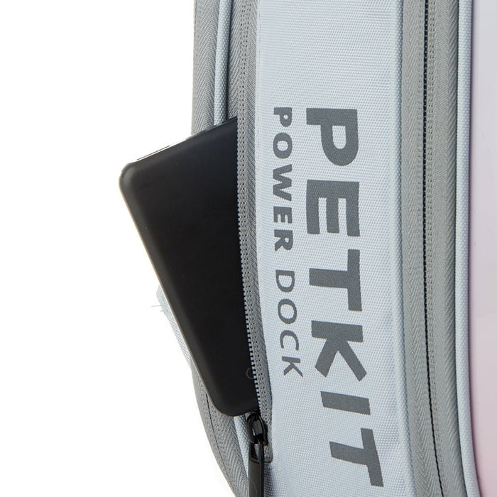 Breezy 2 Cat Carrier featuring a side zipper pocket designed to hold a power bank for powering the built-in fan and lighting system