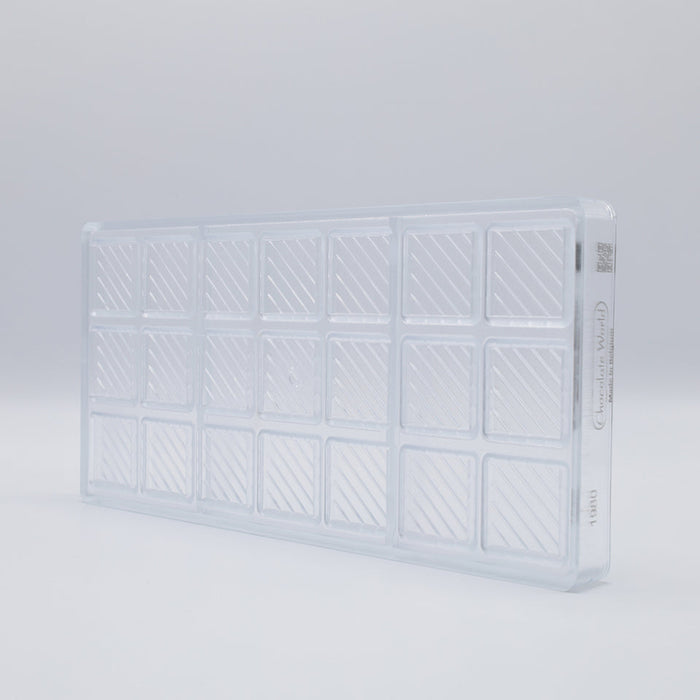 Chocolate World Caraque with Lines Polycarbonate Chocolate Mold – ~1.97 x 1.18 x 0.20 in, 18 Cavities