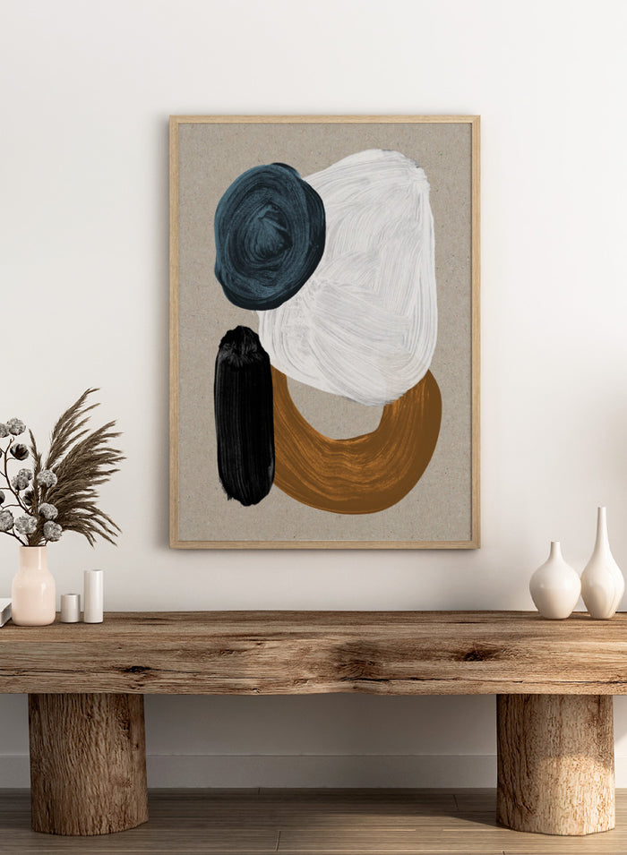 Abstract art print featuring textured paint strokes in dark teal, white, black, and ochre brown on a warm beige background. Shop Late In the Afternoon by Dan Hobday, a contemporary abstract wall art print with bold organic shapes, deep blue, black, white, and warm neutral tones.