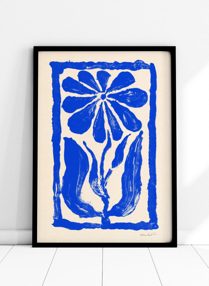 Blue floral design on a beige background. Blue Bloom by Eden Kalif is a modern floral art print featuring bold blue flower forms and graphic composition in a contemporary wall poster design.