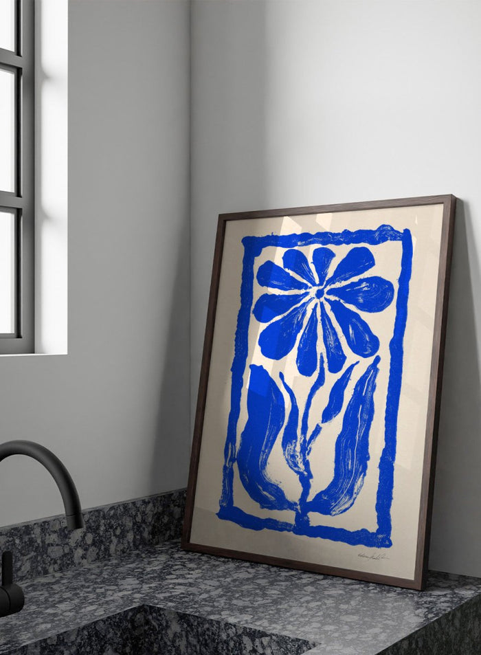 Blue floral design on a beige background. Blue Bloom by Eden Kalif is a modern floral art print featuring bold blue flower forms and graphic composition in a contemporary wall poster design.