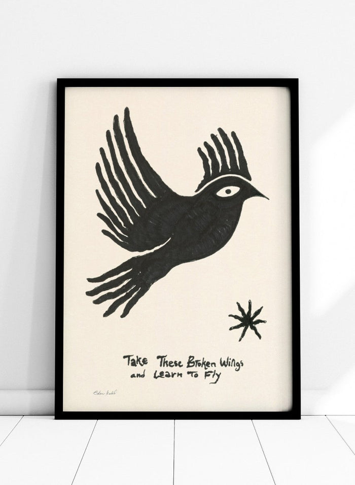 Black bird illustration with 'Take These Broken Wings and Learn to Fly' text on a beige background. Fly Away by Eden Kalif is a modern bird art print with expressive line work and handwritten text, a contemporary minimalist wall poster about growth and freedom.