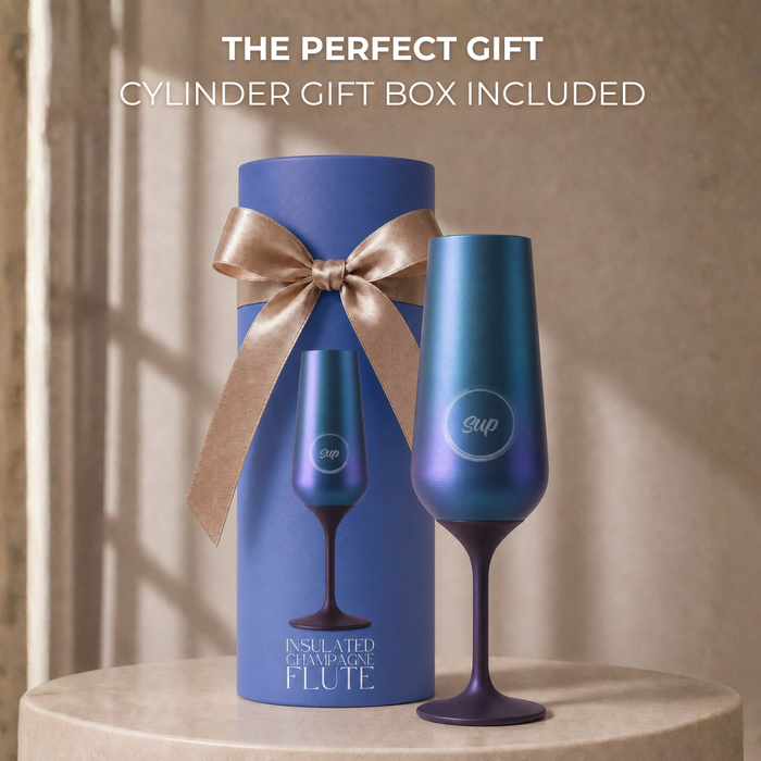Blue insulated champagne flute with matching cylindrical gift box featuring a bow on a neutral background.