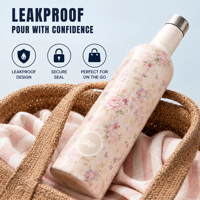 A floral insulated water bottle with a leakproof seal, resting inside a woven straw tote bag on pink striped fabric. The image includes marketing text and icons highlighting leakproof design, secure seal, and perfect for on-the-go use.