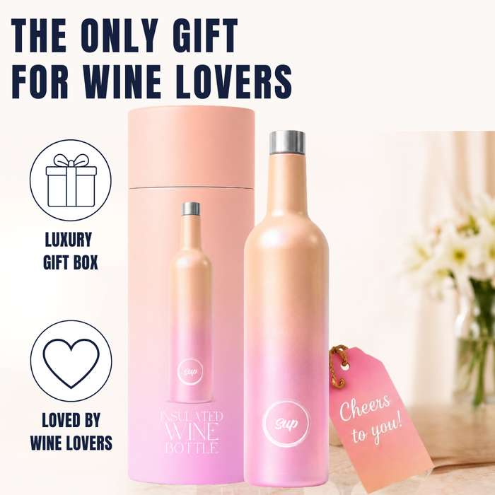 A pink gradient insulated wine bottle with a silver cap stands next to its matching cylindrical gift box. The image includes promotional text reading 'THE ONLY GIFT FOR WINE LOVERS' and icons for 'LUXURY GIFT BOX' and 'LOVED BY WINE LOVERS'.