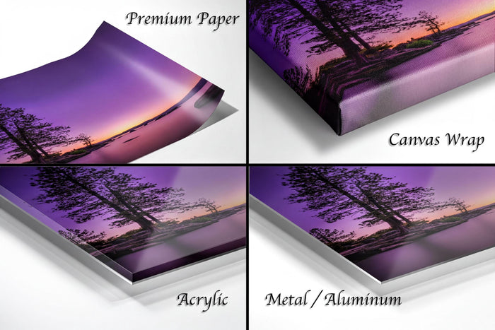 The image is a collage of four different views of a sunset landscape, each with a different material or finish. The text labels the images as "Premium Paper", "Canvas Wrap", "Acrylic", and "Metal/Aluminum".