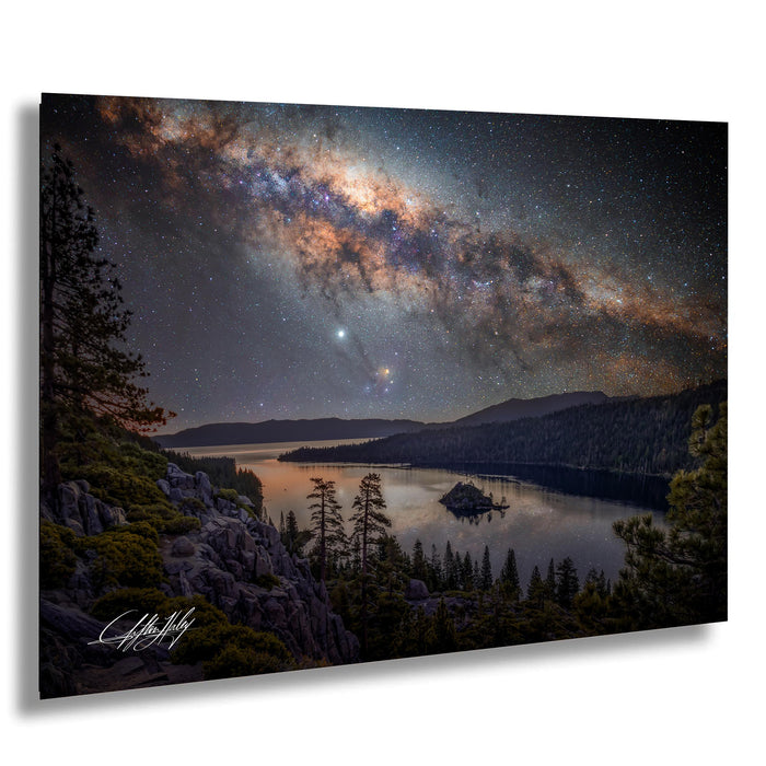 a breathtaking night sky over a serene lake, with a stunning view of the Milky Way galaxy stretching across the frame.