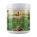 Lakeside Cocoa Crunchy Pistachio Filling 1 kg product packaging,
Lakeside Cocoa Crunchy Pistachio Filling used in cakes, pastries, pralines, and chocolate bars,
Close-up of Lakeside Cocoa pistachio cream with crunchy pistachio pieces.