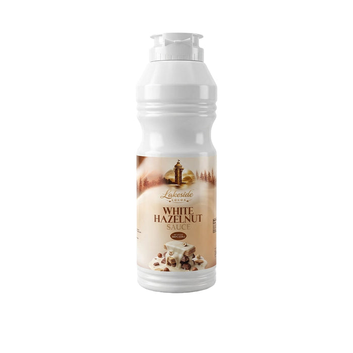 Lakeside Cocoa White Hazelnut Sauce 1 Liter product packaging,
Lakeside Cocoa White Hazelnut Sauce drizzled over cakes, waffles, pancakes, and desserts,
Premium Lakeside Cocoa white chocolate hazelnut dessert sauce for bakery and café applications