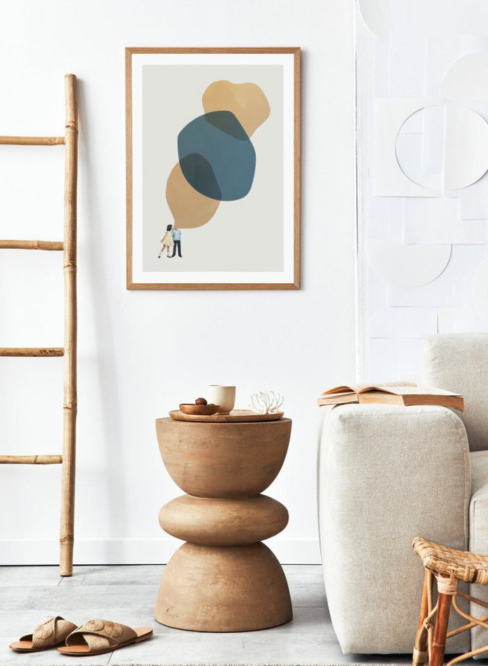 A Thousand Stories to Tell You by Maarten Léon collage art print showing two children with abstract shapes above them. Premium fine art print with real wood framing.