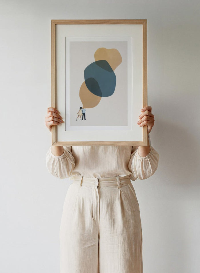 A Thousand Stories to Tell You by Maarten Léon collage art print showing two children with abstract shapes above them. Premium fine art print with real wood framing.
