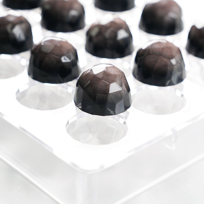 Martellato Aotrom polycarbonate chocolate mold with 28 geometric praline cavities in transparent plastic (View 2)