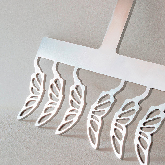 Martellato Butterfly stainless steel chocolate decorating comb H60 mm product image,
Martellato Butterfly decorating comb designed by Frank Haasnoot,
Martellato stainless steel decorating comb for creating butterfly wing-shaped chocolate decorations