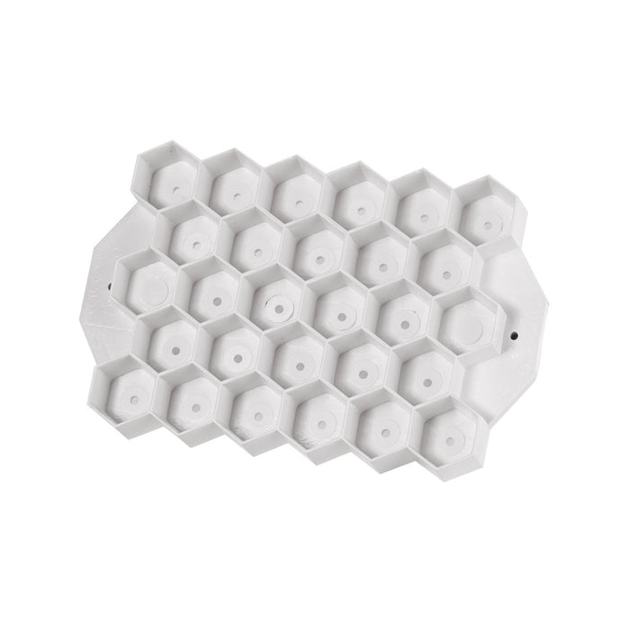 Martellato hexagonal turtle bread mold imprinting pattern on artisan bread dough