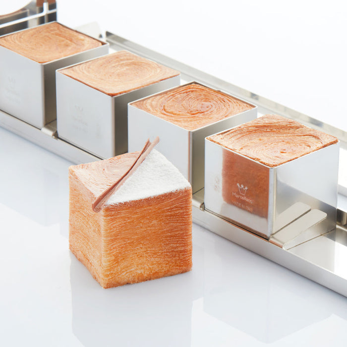 Martellato Mini Cubò 5 stainless steel travel cake mold product image,
Martellato Mini Cubò 5 geometric stainless steel mold for individual cube cakes,
Martellato professional five-cavity cube travel cake mold for modern pastry creations