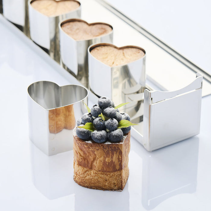 Martellato Mini Love 5 stainless steel travel cake mold product image,
Martellato Mini Love 5 heart-shaped stainless steel mold for individual cakes,
Martellato professional heart travel cake mold for baking and pastry creations