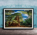 A framed photograph depicting a serene forest scene with towering trees, a wooden walkway, and a blue sky with clouds.