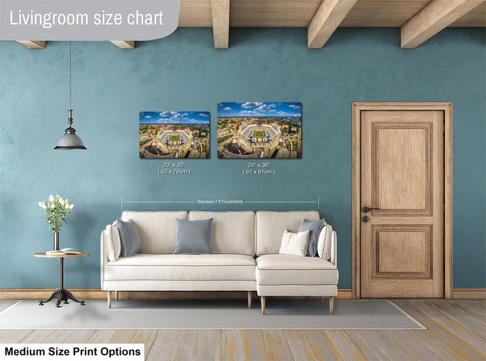 a living room with a white sofa, a wooden door, and a painting of a stadium on the wall. The painting is of a size chart for living room furniture, indicating the dimensions of the sofa and the door.