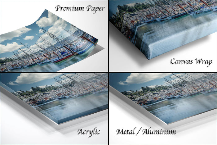 The image is a collage of four photos depicting a marina with sailboats. The collage includes three different views of the marina, including a close-up of the boats, a wider view of the marina, and a close-up of the water. The collage is labeled as "Premium Paper", "Canvas Wrap", "Acrylic", and "Metal/Aluminum".