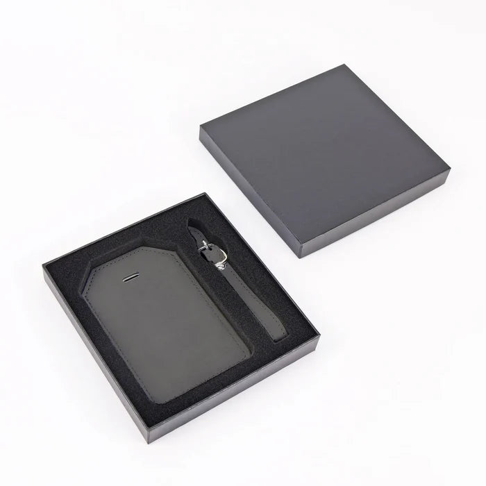 Grey vegan leather luggage tag in a gift box with matching strap and card insert