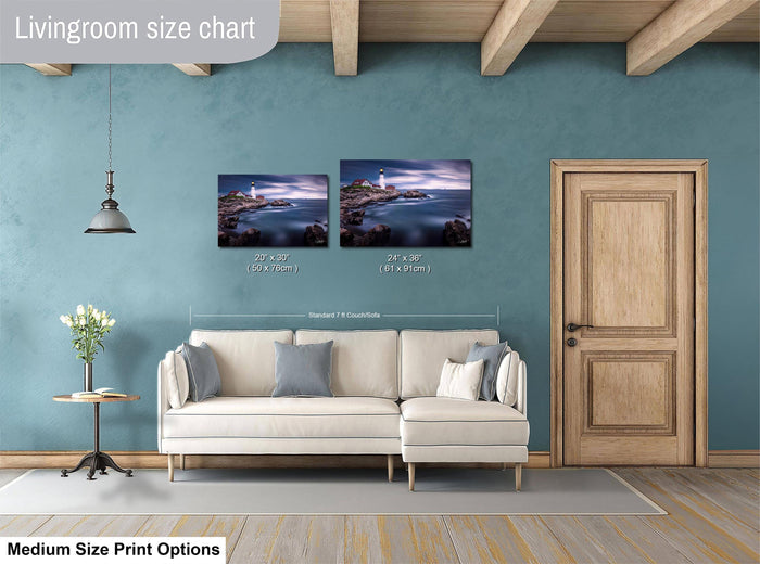 a living room with a white sofa, a wooden door, and a painting of a lighthouse on the wall. The painting is of medium size, and the living room appears to be designed for relaxation and comfort.