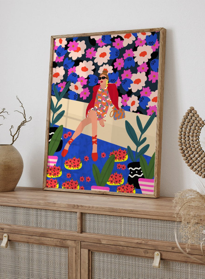 Colorful illustration of a woman sitting on a bench with floral and plant patterns. Bold and Blooming by Rafaela Mascaro fine art print poster featuring woman in vibrant floral garden by water, modern contemporary botanical wall art.