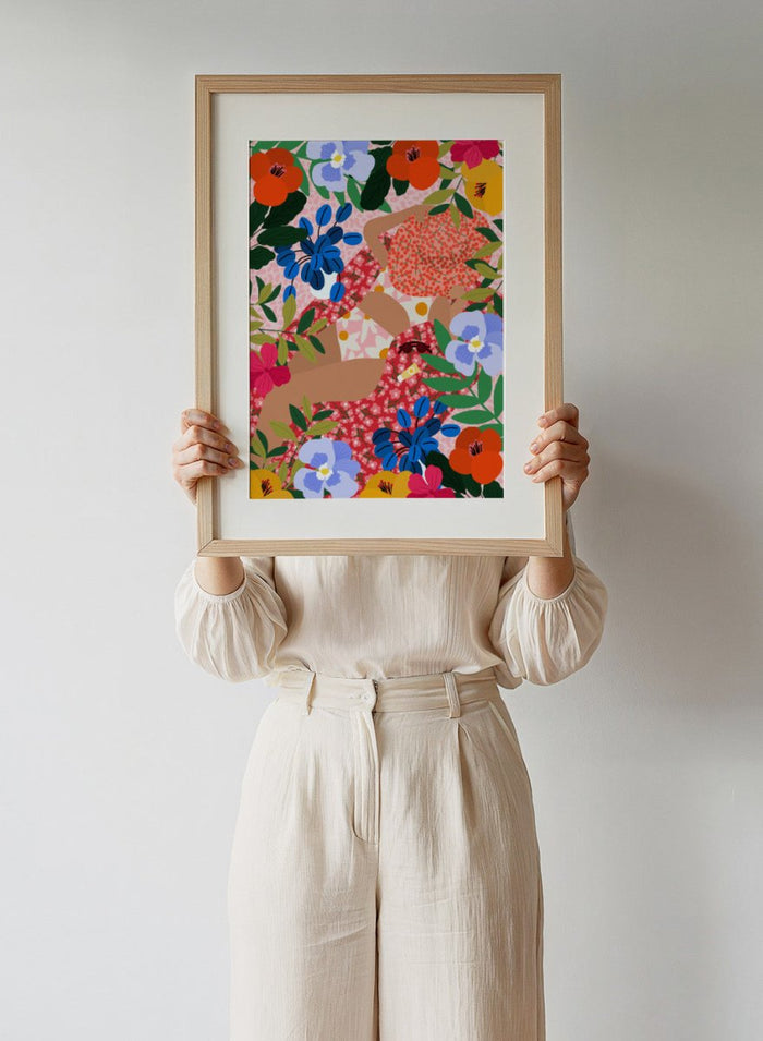 Colorful floral pattern with abstract shapes on a pink background. Sleeping Under the Sun by Rafaela Mascaro fine art print poster featuring woman in vibrant floral garden, modern contemporary botanical wall art.