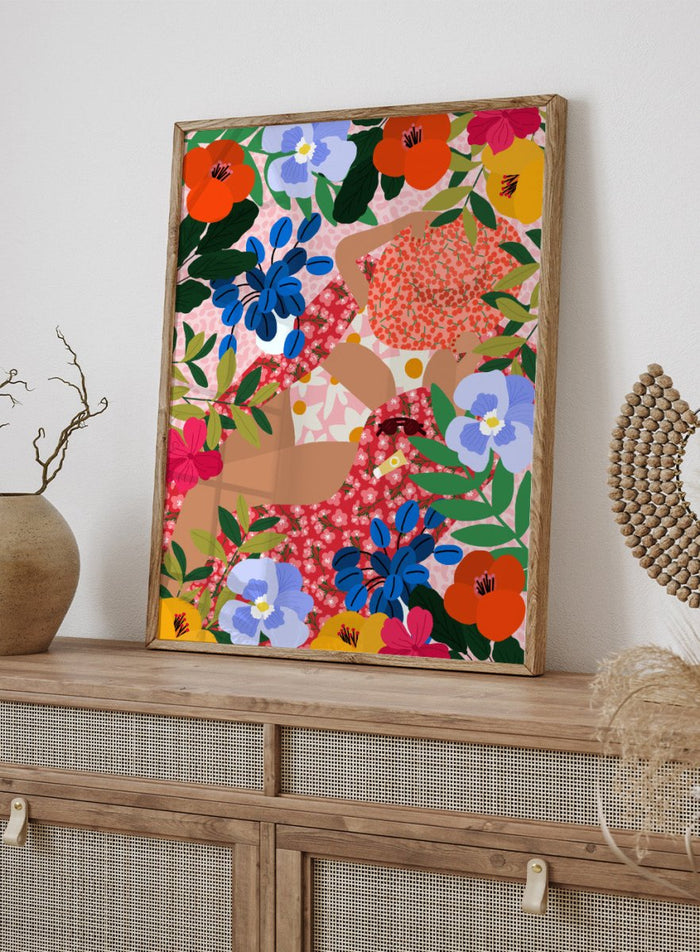 Colorful floral pattern with abstract shapes on a pink background. Sleeping Under the Sun by Rafaela Mascaro fine art print poster featuring woman in vibrant floral garden, modern contemporary botanical wall art.