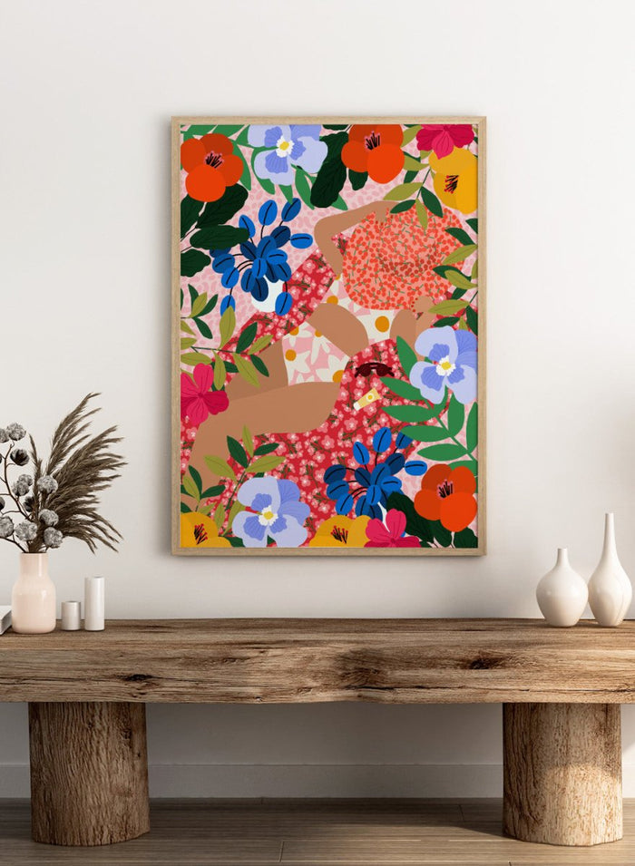 Colorful floral pattern with abstract shapes on a pink background. Sleeping Under the Sun by Rafaela Mascaro fine art print poster featuring woman in vibrant floral garden, modern contemporary botanical wall art.