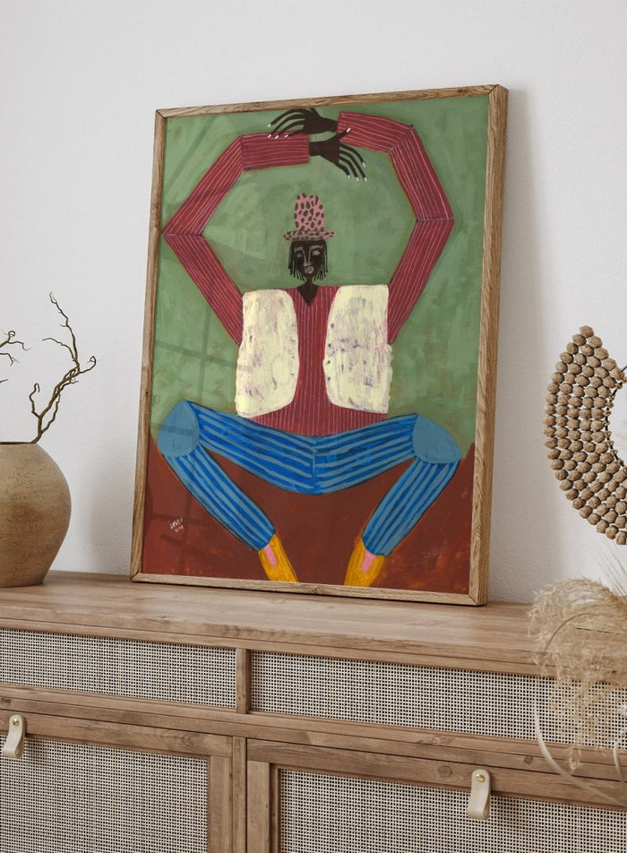 Artistic depiction of a figure with red shirt, blue pants, and yellow shoes on a green background. Open Up by Studio IMO (Ibi Meier-Oruitemeka) is a modern figurative art print featuring a seated figure with bold color and contemporary portrait poster design.