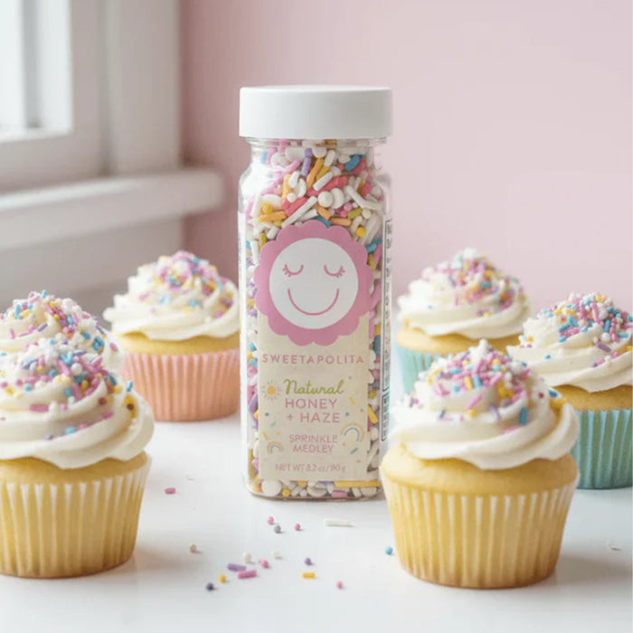Bulk tub of Sweetapolita Honey and Haze Sprinkle Medley, naturally coloured honey and amber sprinkle mix for bakery use