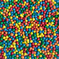 Bottle of Sweetapolita Natural Rainbow Bit Chips, flat multicoloured plant-coloured chip-shaped sprinkles