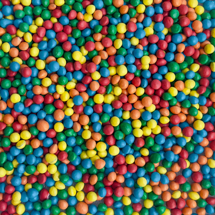 Bottle of Sweetapolita Natural Rainbow Bit Chips, flat multicoloured plant-coloured chip-shaped sprinkles