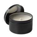 Small white tea scented candle in a 4oz jar with a personalized custom label